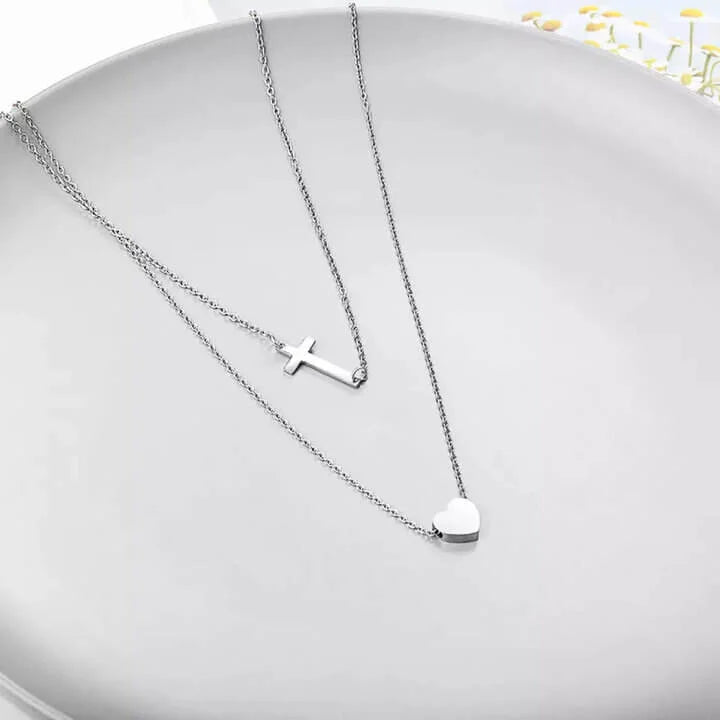 Collier croix chrétienne et cœur argent sur support