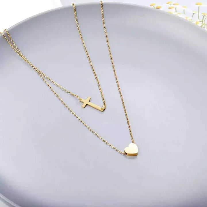 Collier croix chrétienne et cœur or sur support