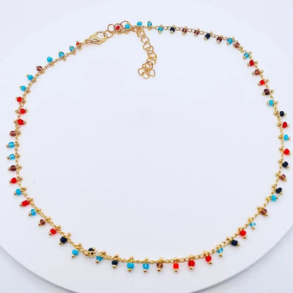 Collier pendentifs Gigi Clozeau et perles colorées or