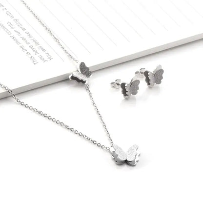 Collier boucles d'oreilles papillon argent
