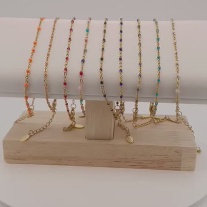 Bracelet Gigi Clozeau doré avec perles de couleurs video