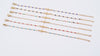 Bracelet croix Gigi Clozeau avec perles colorées video