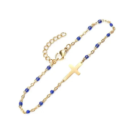 Bracelet croix Gigi Clozeau avec perles colorées perles bleues