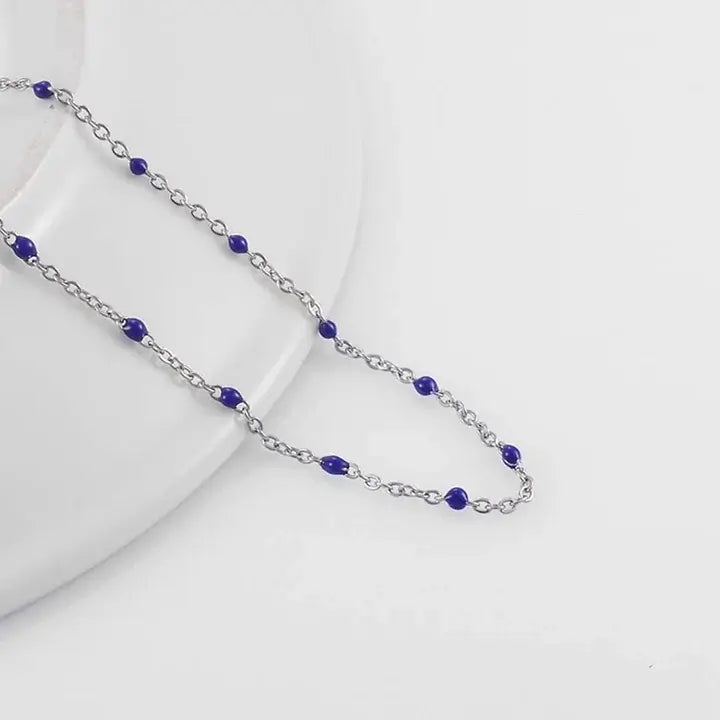 Bracelets Gigi Clozeau argenté avec perles de couleur bleu foncé