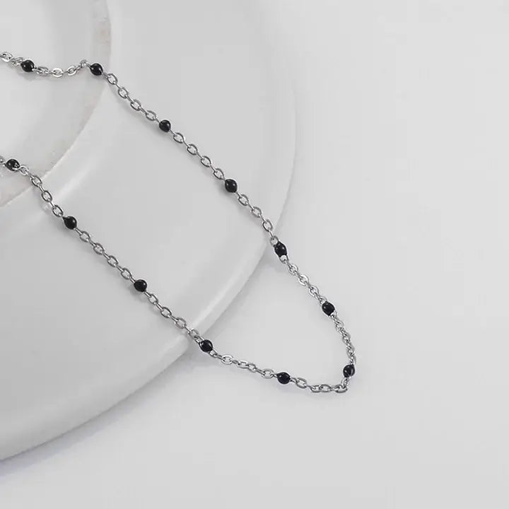 Bracelets Gigi Clozeau argenté avec perles de couleur noire