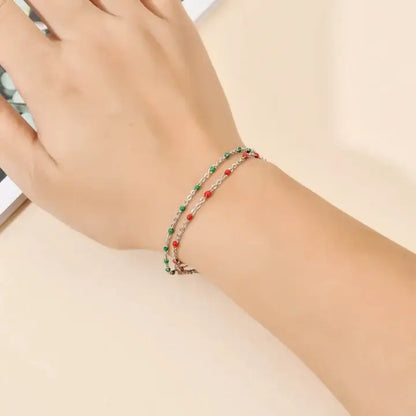 Bracelets Gigi Clozeau argenté avec perles de couleur porté